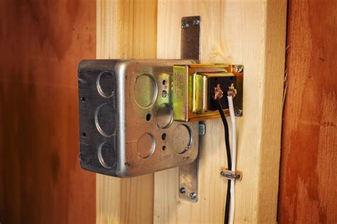 making junction box from door bell box|attach doorbell transformer to box.